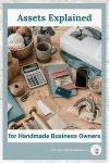 Flat lay of handmade business supplies including yarn, sewing machine, calculator, cash, phone, packaging, and craft tools on a wooden desk.