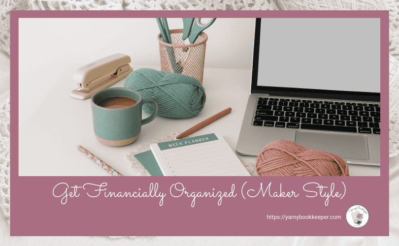 Calm handmade business workspace with yarn, planner, and laptop representing financially organized bookkeeping systems for makers.